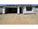 Exterior view of a single Gathering home featuring a two-car garage with unfinished roof at 2356 E Spur Dr, San Tan Valley, AZ 85140
