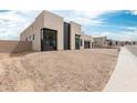 Contemporary home featuring unique architectural details, clean lines and desert landscaping at 33857 N Borgata Trl, San Tan Valley, AZ 85144