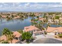 Lakeside homes with terracotta roofs are beautifully positioned within a tranquil community at 3520 N 110Th Ave, Avondale, AZ 85392