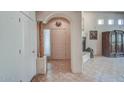 Inviting front entrance with tile flooring, high ceilings, an art-deco inspired entrance, and rustic design elements at 38065 N Cave Creek Rd # 9, Cave Creek, AZ 85331