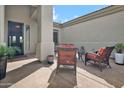Cozy outdoor patio area featuring comfortable seating, ideal for relaxing and enjoying the fresh air at 4607 E Sierra Sunset Trl, Cave Creek, AZ 85331