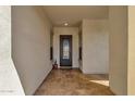 Welcoming entryway with decorative tile flooring and an elegant front door at 10350 E Texas Ave, Mesa, AZ 85212