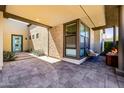 Inviting courtyard featuring stone accents, stylish seating, and a cozy fire pit for outdoor relaxation at 1341 E Paseo Way, Phoenix, AZ 85042
