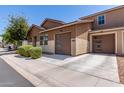 View of the home showcasing the one-car garage and modern design at 1931 E Lantana Dr, Chandler, AZ 85286