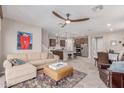 Open-concept living room with kitchen and a neutral color palette at 1931 E Lantana Dr, Chandler, AZ 85286