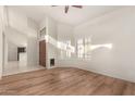 A spacious room with wood flooring and bright natural light at 2309 W Shawnee Dr, Chandler, AZ 85224