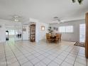 Spacious dining area features tile flooring, bright light, and large windows for natural light at 3108 W Butler Dr, Phoenix, AZ 85051