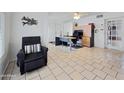 Bright office area includes tile flooring, bright light, and large windows for natural light at 3108 W Butler Dr, Phoenix, AZ 85051