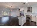 Stylish kitchen with stainless steel appliances, a center island, and ample counter space at 4201 N 35Th St, Phoenix, AZ 85018