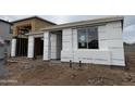 An in-progress home exterior view shows construction with HPI Form Control and a visible window install at 7674 W Rowel Rd, Peoria, AZ 85383