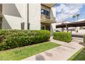 Inviting front entrance with well-maintained landscaping and a charming, painted brick facade at 7740 E Heatherbrae Ave # 13, Scottsdale, AZ 85251