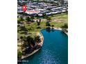 Aerial view of community with lake, park, walking path and convenient access to outdoor amenities at 8113 E Vista Dr, Scottsdale, AZ 85250
