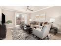 Cozy living room featuring a sliding glass door to the outside at 8250 E Arabian Trl # 120, Scottsdale, AZ 85258