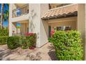 Charming condo exterior with well-maintained landscaping and a welcoming entrance at 14145 N 92Nd St # 1158, Scottsdale, AZ 85260