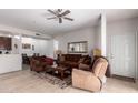 Cozy living room featuring tile flooring, neutral walls, and comfortable seating at 14145 N 92Nd St # 1158, Scottsdale, AZ 85260