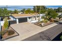 Charming single-story home with a well-kept front yard and a two-car garage at 544 W Thunderbird Rd, Phoenix, AZ 85023