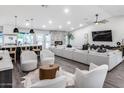 Bright and airy living room featuring a fireplace and a modern, neutral-toned decor at 5975 E Larkspur Dr, Scottsdale, AZ 85254