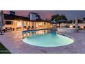 Beautiful backyard pool area with ample lounge space, a covered patio, and a luxurious gazebo, perfect for outdoor relaxation at 5975 E Larkspur Dr, Scottsdale, AZ 85254
