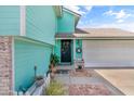 Charming two-story home with a garage and welcoming front entrance at 1822 N Sunaire Cir, Mesa, AZ 85205