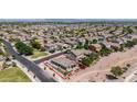 Beautiful aerial view of a single-Gathering home nestled in a well-maintained residential neighborhood, featuring a defined property line at 20941 E Pecan Ln, Queen Creek, AZ 85142