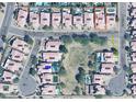 Aerial view of the neighborhood and the house, which features a private pool at 4446 E Woodridge Dr, Phoenix, AZ 85032