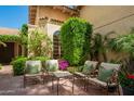 Relaxing courtyard featuring stylish seating, vibrant greenery, and a peaceful ambiance at 7500 E Mccormick Pkwy # 73, Scottsdale, AZ 85258