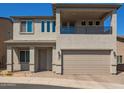 Charming two-story home with a two-car garage and balcony on the second floor, located in a sunny area at 8026 S 6Th Dr, Phoenix, AZ 85041
