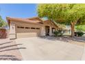 Beautifully landscaped home with a spacious driveway and a charming covered entrance at 1072 E Jade Dr, Chandler, AZ 85286