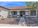 Welcoming front entrance with well-maintained landscaping and a cozy walkway at 1617 E Fremont Rd, Phoenix, AZ 85042