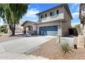 Inviting two-story home with a two-car garage and a well-kept driveway in a friendly community at 17812 N Carmen Ave, Maricopa, AZ 85139