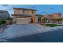 Charming home with a two-car garage and a beautifully landscaped front yard at 4894 E Palm Beach Dr, Chandler, AZ 85249