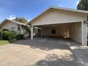 Spacious carport provides ample covered parking with convenient access to the home's entrance at 601 W 15Th St, Tempe, AZ 85281