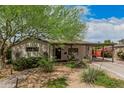 Attractive home with a covered carport, a brick walkway, and appealing landscaping at 6726 N 11Th St, Phoenix, AZ 85014