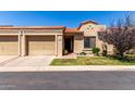 Charming single-story home featuring a tile roof, two-car garage, and well-maintained front yard at 1021 S Greenfield Rd # 1194, Mesa, AZ 85206