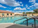 Enjoy the community pool with lounge chairs and a clean, refreshing atmosphere at 425 S Parkcrest -- # 335, Mesa, AZ 85206