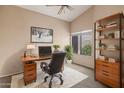 Inviting home office with vaulted ceiling, modern desk, and a cozy rug at 5 W Ranch Rd, Tempe, AZ 85284