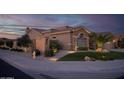 Inviting exterior with desert landscaping, a fire hydrant, and attractive stonework at 15664 W Vernon Ave, Goodyear, AZ 85395