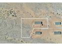 Aerial view of homesite showing the layout of the properties in the surrounding landscape at 23134 W Duane Ln, Wittmann, AZ 85361