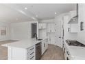 Spacious kitchen with stainless steel appliances, island, and ample counter space at 24054 N 171St Dr, Surprise, AZ 85387