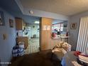 Cozy kitchen space with essential appliances and adjacent eating area at 14839 N 29Th Dr, Phoenix, AZ 85053