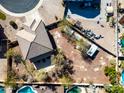 Aerial view showcasing property lot and neighborhood features, including nearby pools at 1849 S 225Th Dr, Buckeye, AZ 85326