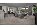 Spacious open-concept living area showcasing modern tile flooring and an inviting layout for comfortable living at 2437 W Jessica Ln, Phoenix, AZ 85041