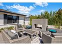 Inviting outdoor patio features a brick fireplace and comfortable seating, perfect for entertaining or relaxing at 3630 N 39Th St, Phoenix, AZ 85018