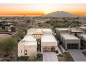 Contemporary home boasting desert views, modern design, and attractive desert landscaping at 37200 N Cave Creek Rd # 1034, Scottsdale, AZ 85262