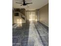 Open living space with tile floors at 4136 N 113Th Dr, Phoenix, AZ 85037
