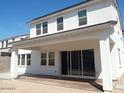 The backyard boasts a covered patio with brick pavers at 4514 N 198Th Ln, Litchfield Park, AZ 85340
