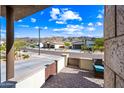 Inviting neighborhood street view featuring well-maintained homes and desert landscaping at 830 E Buist Ave, Phoenix, AZ 85042