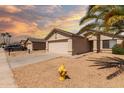A well-maintained single-Gathering home with desert landscaping and a two-car garage enhances curb appeal at 8502 W Pierson St, Phoenix, AZ 85037