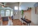 Inviting entryway features stylish decor, wood flooring, and natural light at 4350 E Abraham Ln, Phoenix, AZ 85050