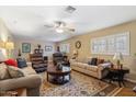 Spacious living room with hardwood floors, ceiling fan, and ample natural light at 8202 E Coolidge St, Scottsdale, AZ 85251